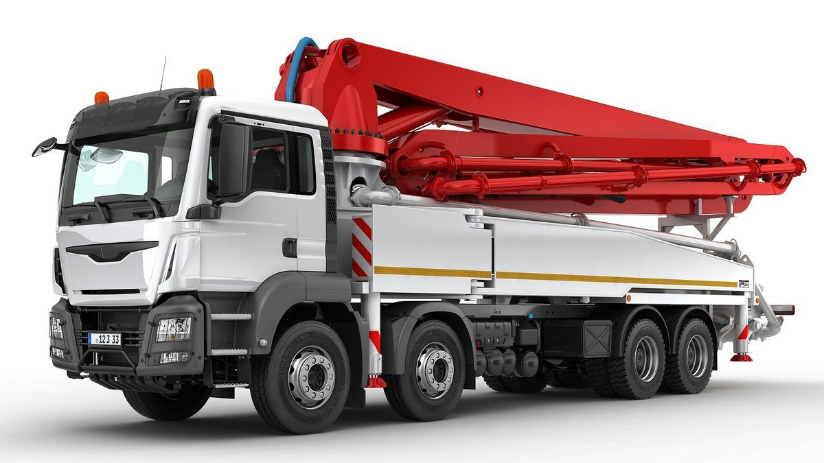 Large-scale 40+ meter concrete boom pump by Balaji Construction & Co. working on a high-rise building in Ajmer.
